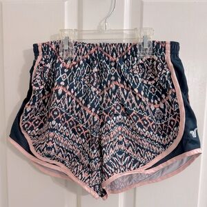 Women’s small varsity brand shorts. Peach and navy blue color.